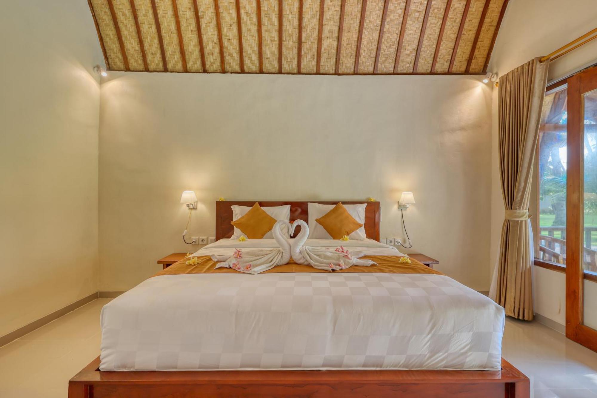 Puri Yalus Bungalow Toyapakeh Habitación foto